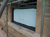 Flood defence frame and glazing system