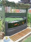 Domestic pond with formed acrylic glazing
