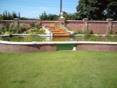 Glazing panel in large landscaped pond