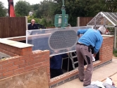 Custom built Koy carp pond glazing installation