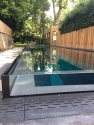 Infinity edge pool glazing