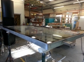 Preglazed pool window and frame