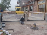 Infinity edge pool glazing installation