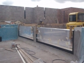 Infinity edge pool glazing installation