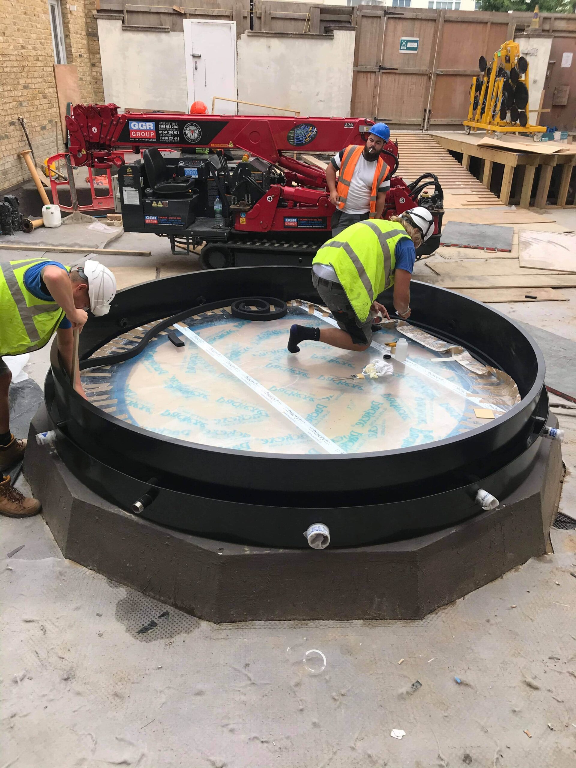 Skylight water feature frame installation